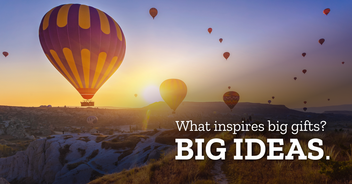 Hot air balloons over Cappadocia, central Anatolia region, Turkey. Sunny with lots of grass and hills. Text on top reads What inspires big fits? Big Ideas.
