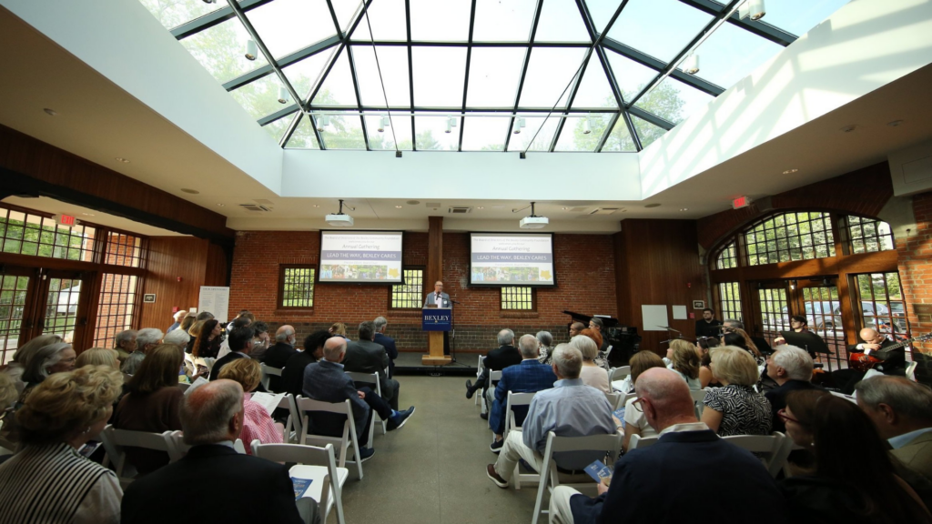 Bexley Community Foundation. Image shows a town meeting.