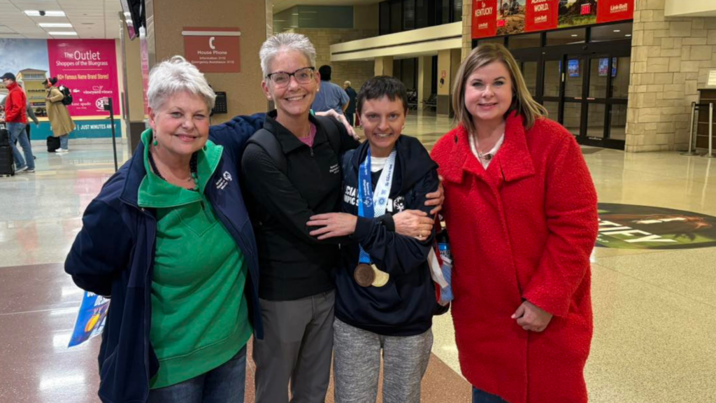 Special Olympics Kentucky. Image shows new CEO with Olympian.