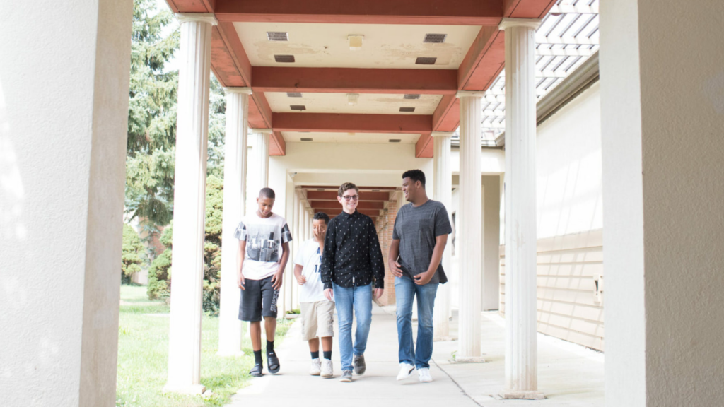 The Buckeye Ranch. Image shows students walking outdoors on campus.