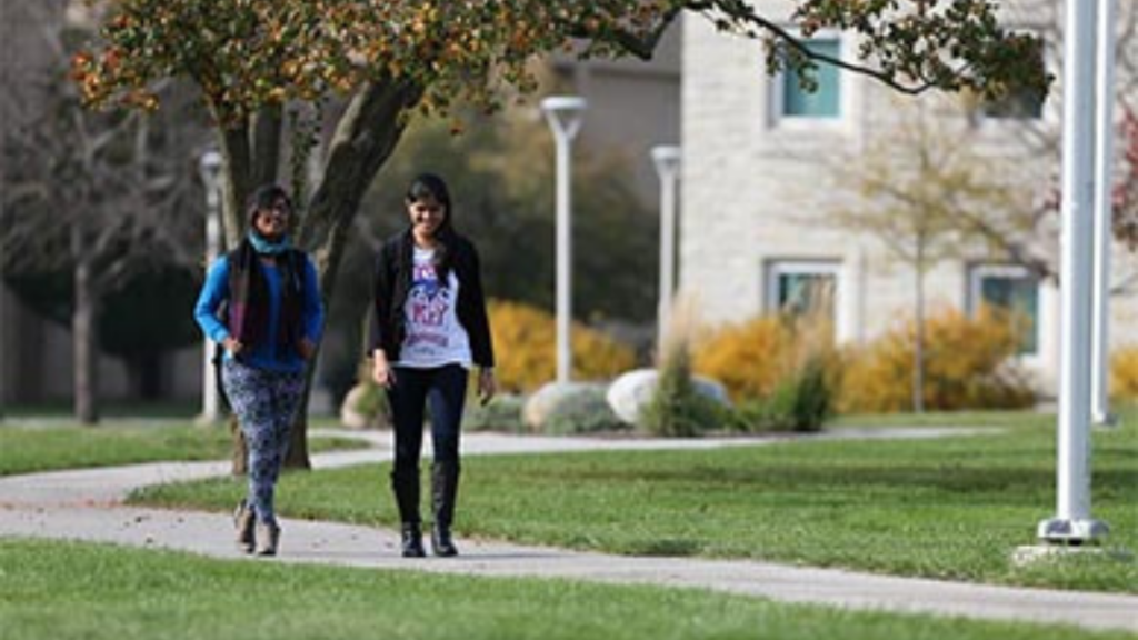 University of Toledo. Image shows students walking on campus.