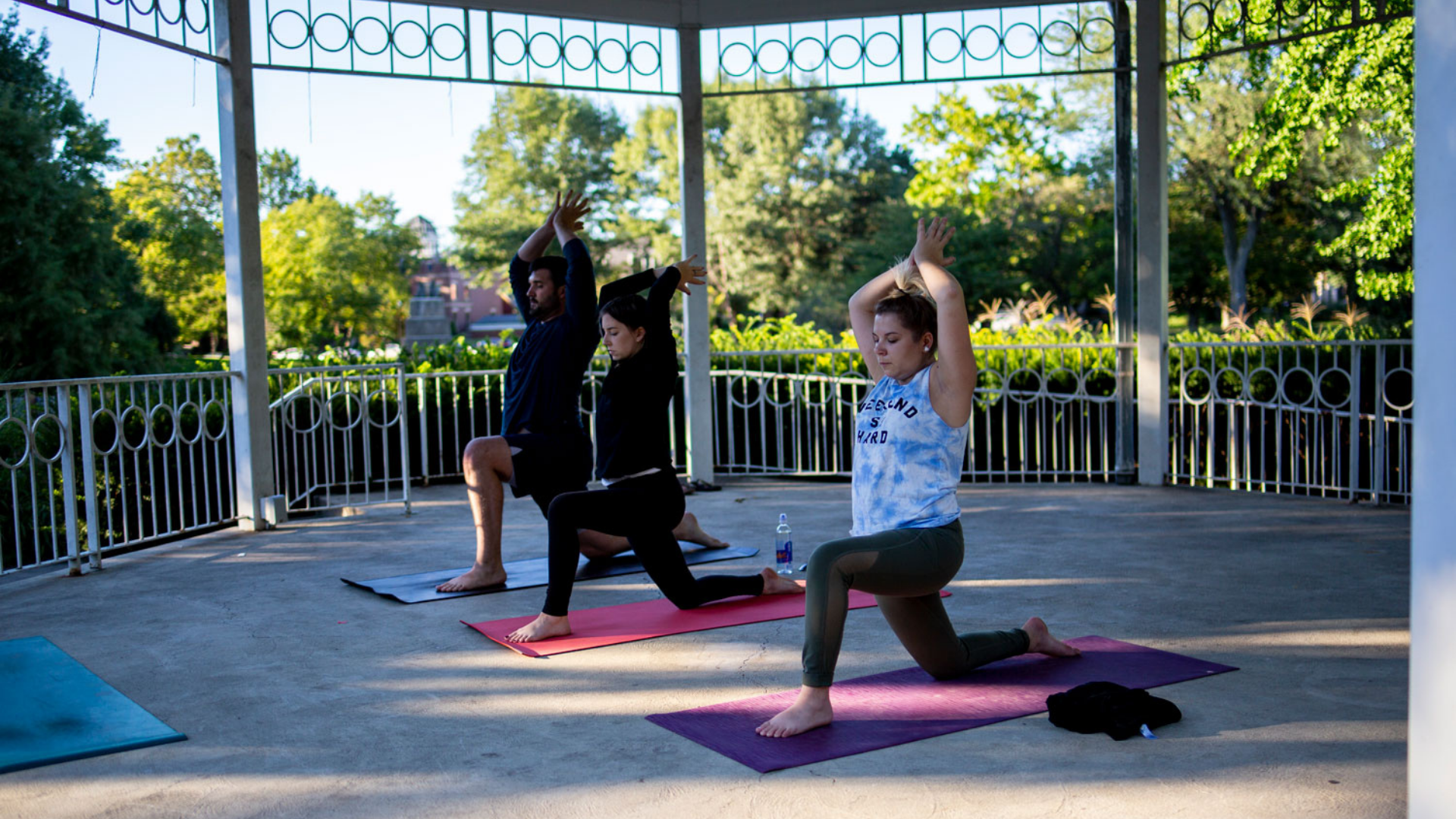 Columbus Recreation and Parks Foundation. Image shows people doing yoga in the park.